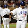 Las Vegas 51s sluggler Randy Ruiz slaps five with a teammate after hitting a home run during the Las Vegas 51s home opener against the Colorado Springs Sky Sox at Cashman Field in Las Vegas  Friday, April 17, 2009. 